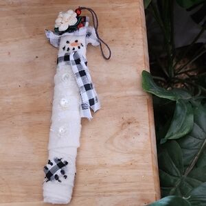 Festive Snowman Ornament with Black and White Scarf